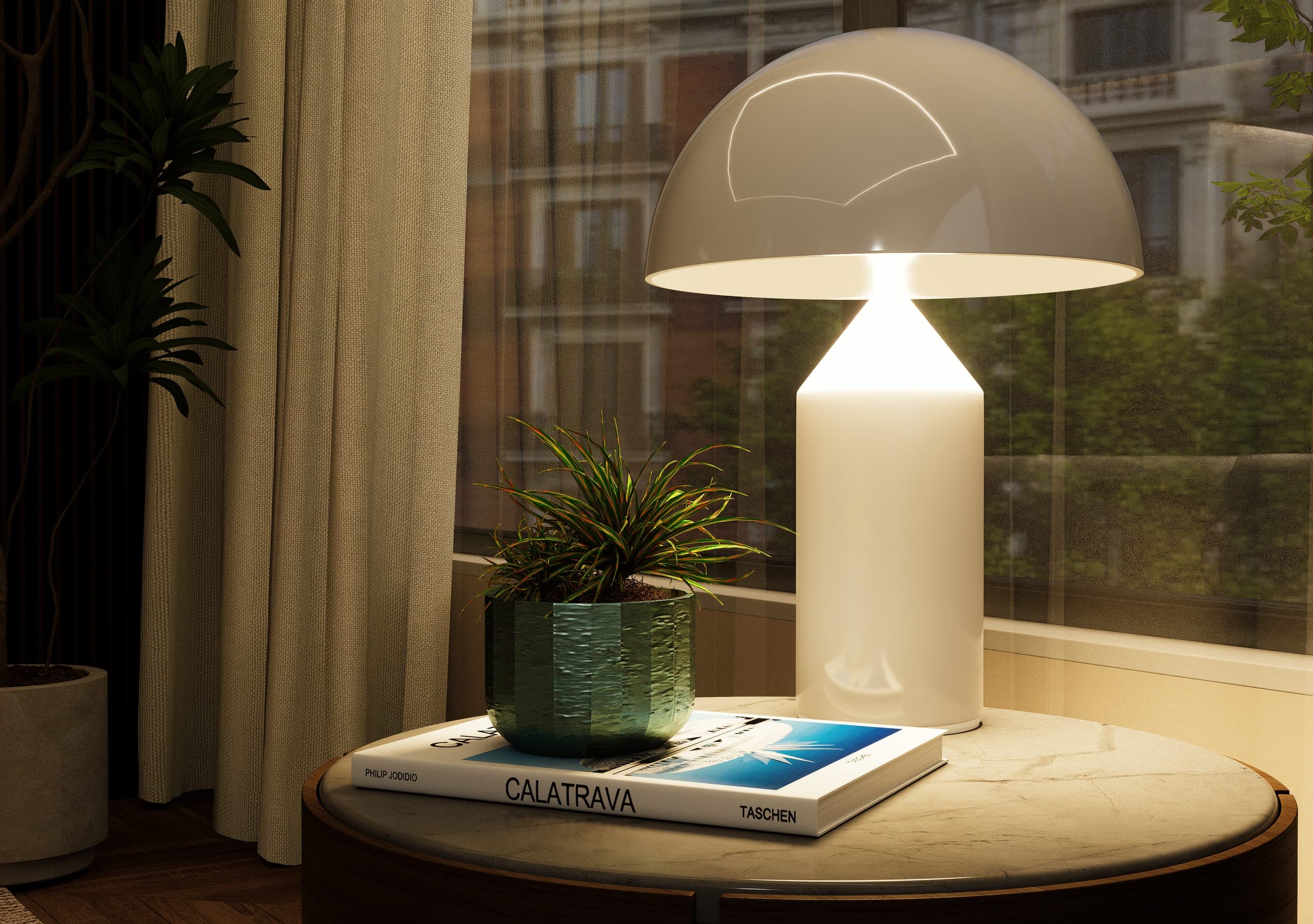 Detail of the lit white lamp on the Calatrava book and a bowl with a plant